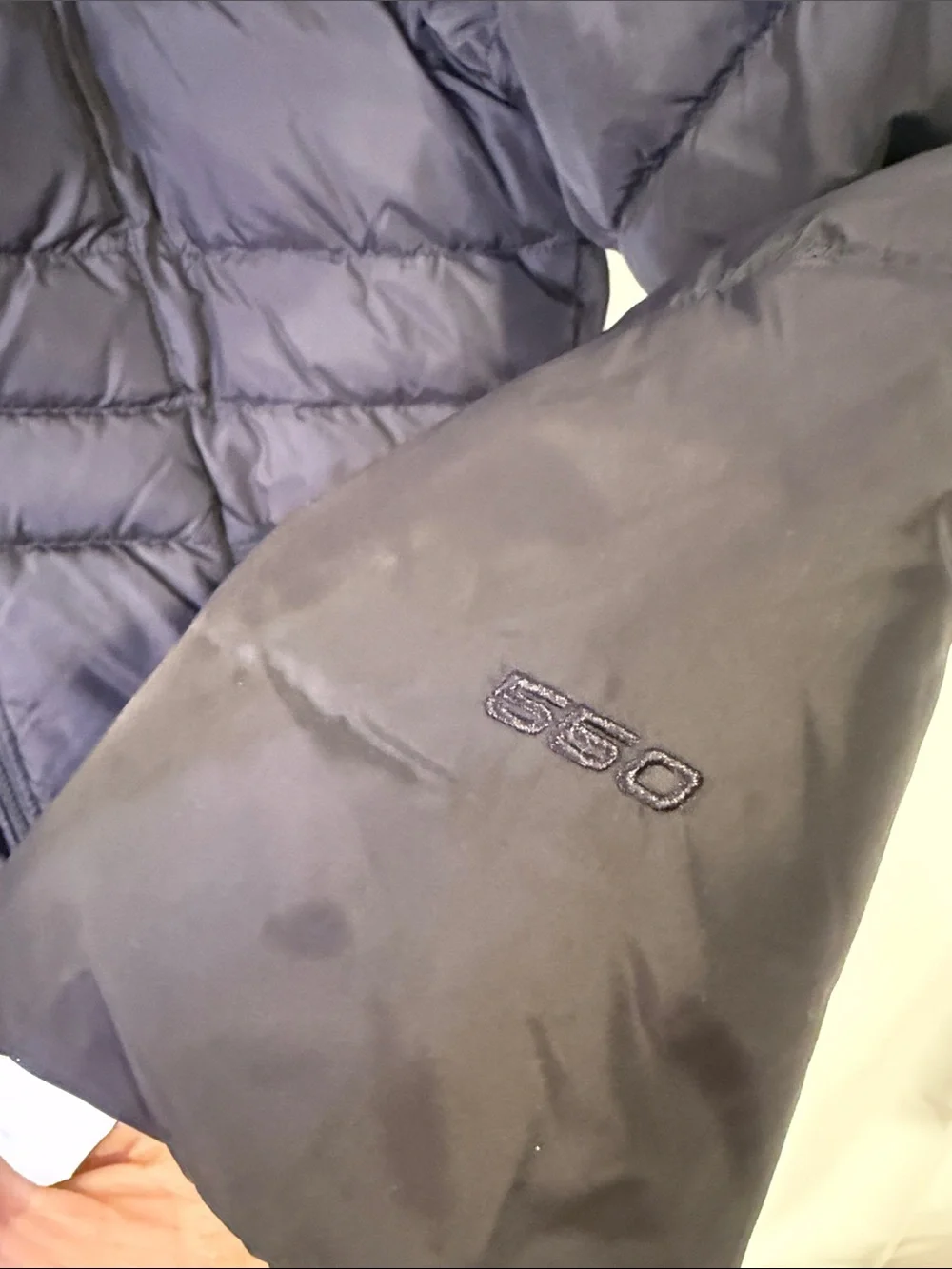 The North Face 550 Kids Black Puffer Jacket with Pink Lining Down Filled
